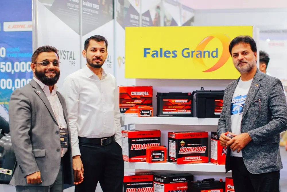 Fales Grand team poses in front of the UAE China Tyre & Auto Parts Expo 2025 backdrop at Expo Centre Sharjah.